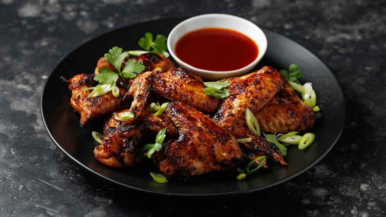 Grilled chicken wings with barbecue sauce