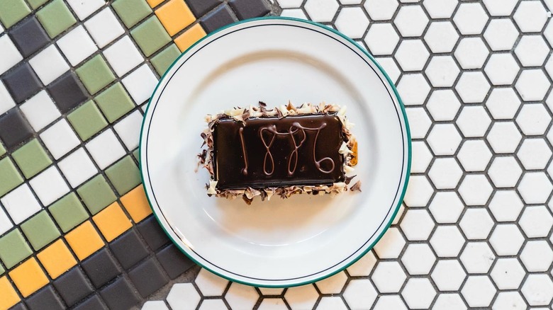 Slice of 1886 Chocolate Cake on a white plate