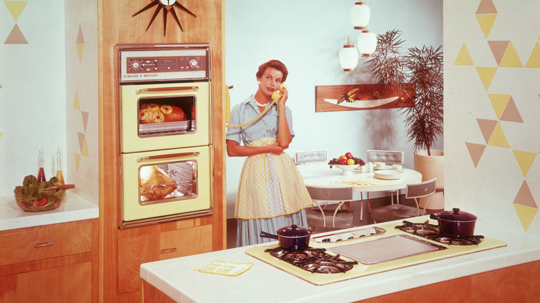 Woman in a 1950s kitchen
