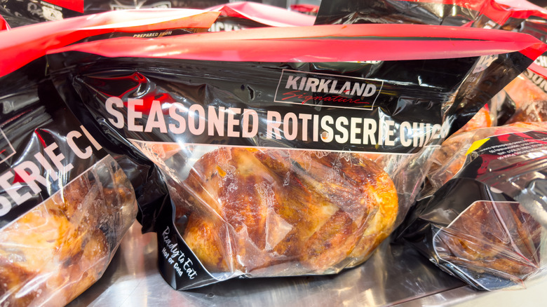 Close up of Costco Kirkland rotisserie chicken in a bag at the store.