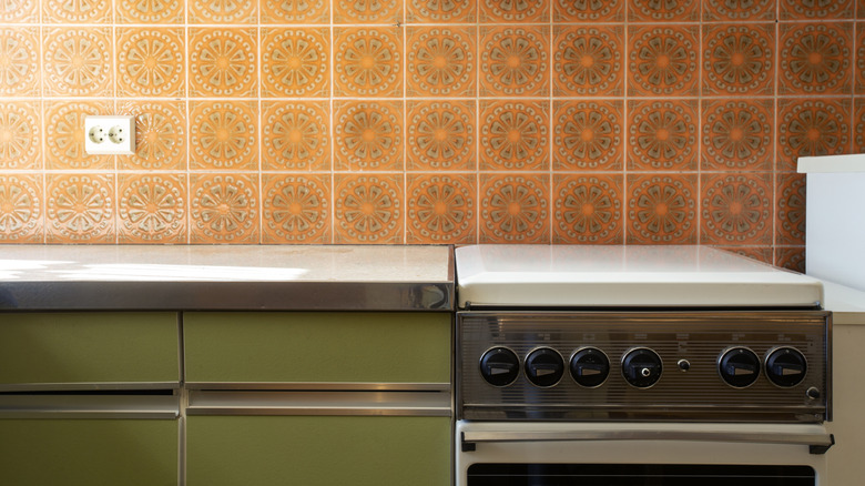 1970s-era kitchen counter, backsplash, and oven
