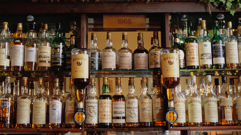 A typical pub with its selection of the most prestigious brands of whiskey on display