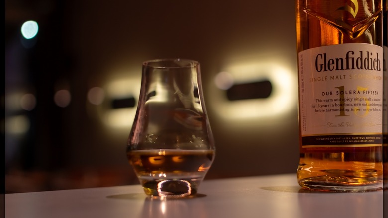 A glass of Scotch whisky on a table