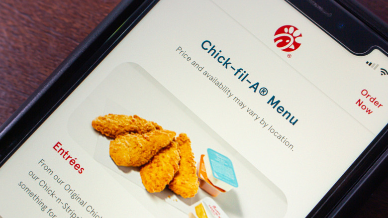 Phone showing the Chick-fil-A app