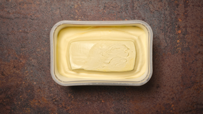 An open box of margarine on a table