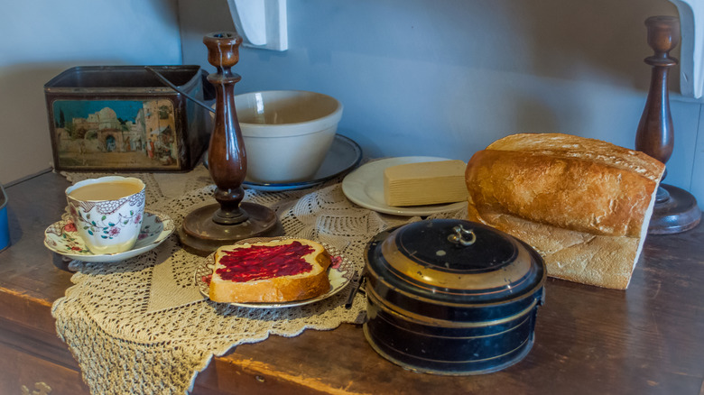 A simple old-timey breakfast of jelly toast, bread, and butter