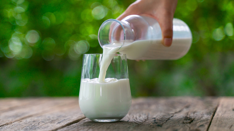 Milk being poured into a glass
