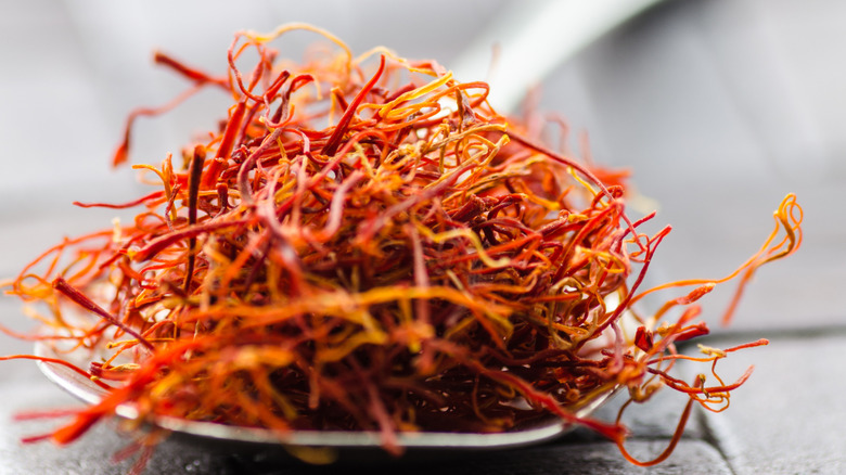 Saffron threads in a spoon