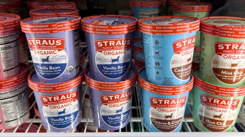 Tubs of Straus ice cream in a freezer