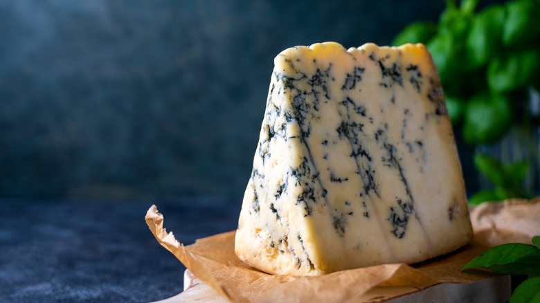 blue cheese wedge on board