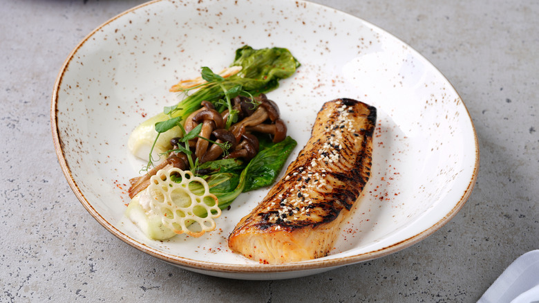 A piece of grilled black cod