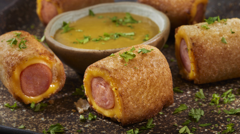 Pigs in blankets with sauce