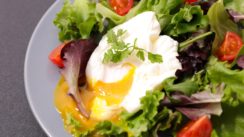 poached egg on a salad