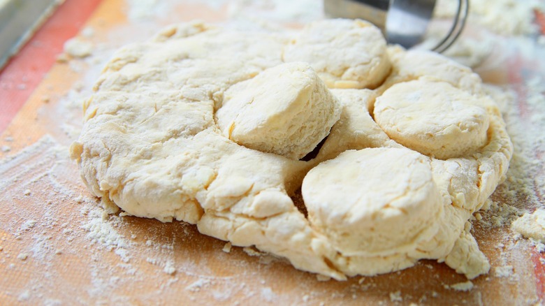 buttermilk biscuit dough on flour