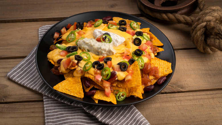 A plate of nachos on a table
