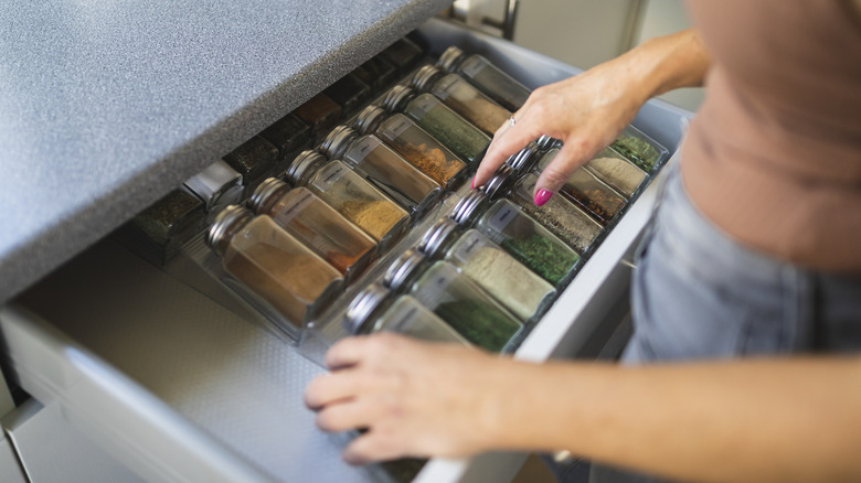 organizing spice drawer