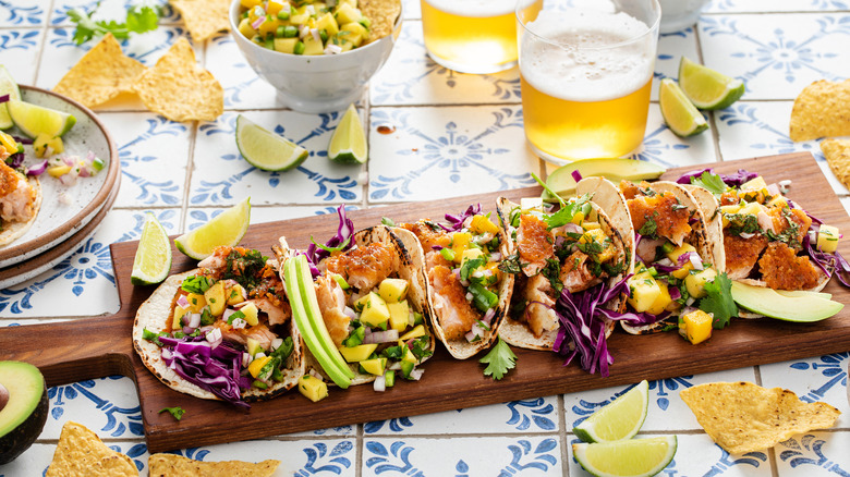 Fish tacos with mango salsa and beer