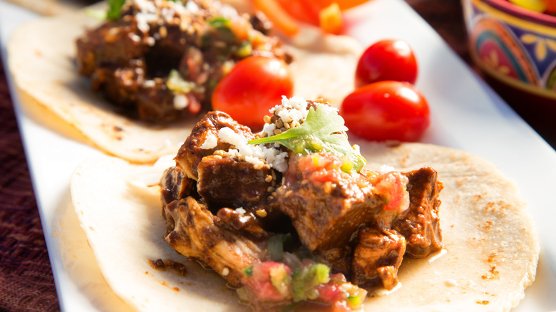 Chicken tacos with mole sauce