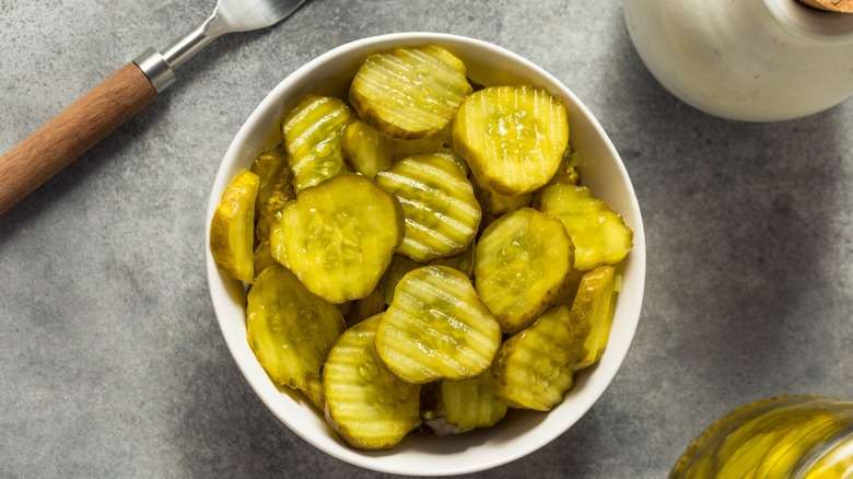 bread and butter pickles in a bowl