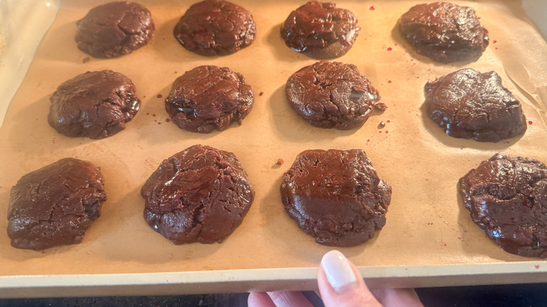 cookies sliding into oven