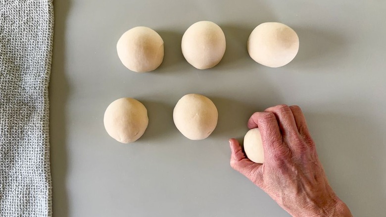 Shaping scallion pancake dough into balls
