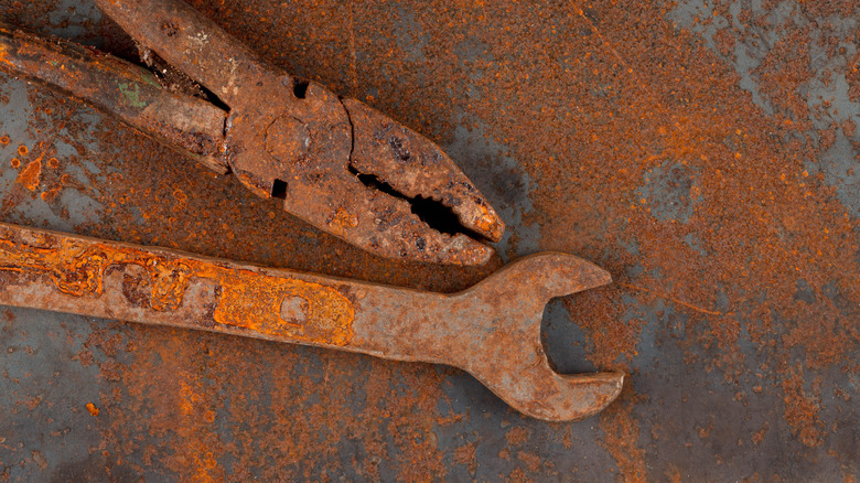 rusty wrench and pliers