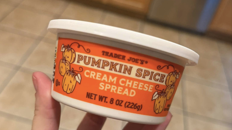 a tub of trader joe's pumpkin cream cheese