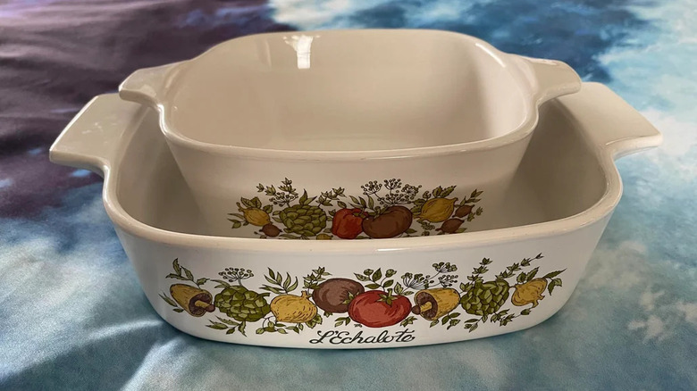 Two Spice of Life casserole dishes stacked on top of each other.