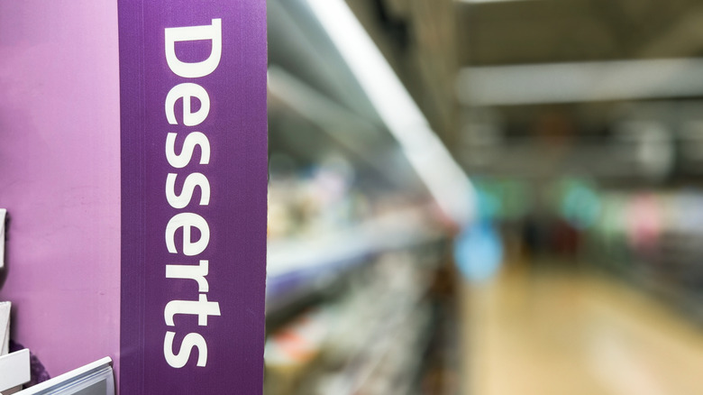A dessert sign at a grocery store