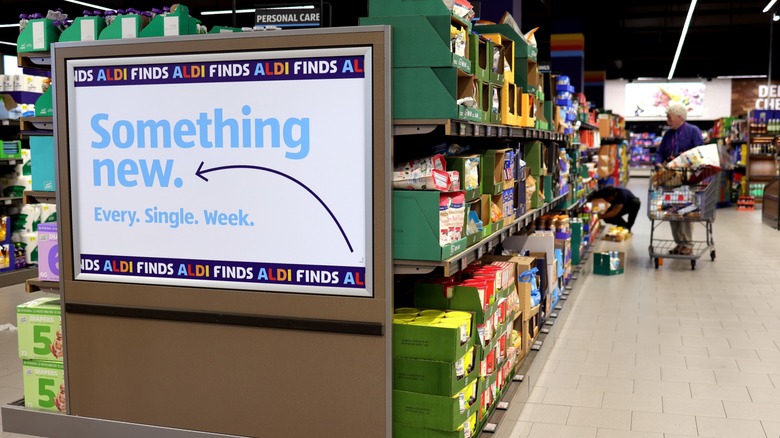 An Aldi Finds board inside the store's aisle