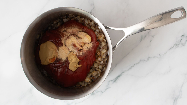 Unmixed barbecue sauce ingredients in saucepan