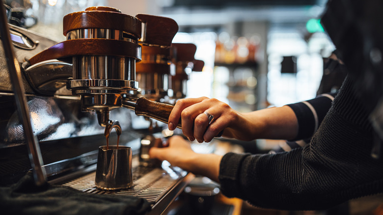 Barista making coffee