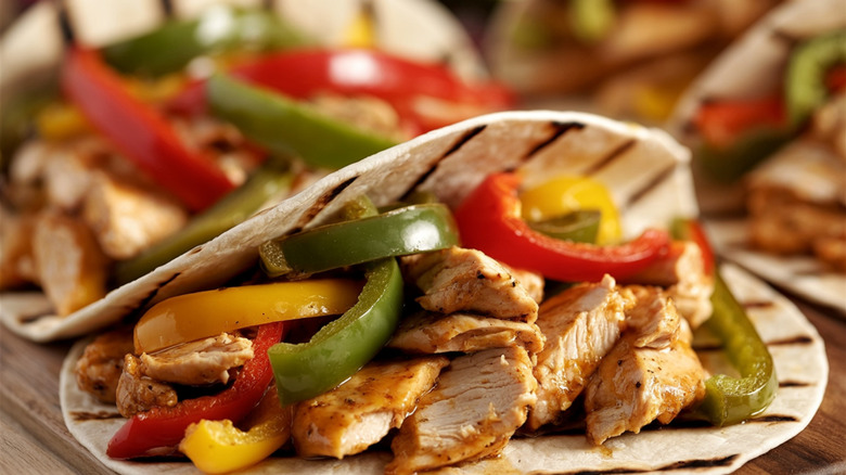 Chicken fajita tacos on fresh flour tortillas