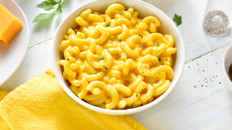 creamy mac and cheese in a white bowl