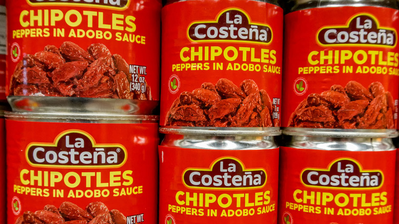 Cans of Chipotle peppers in adobo sauce.