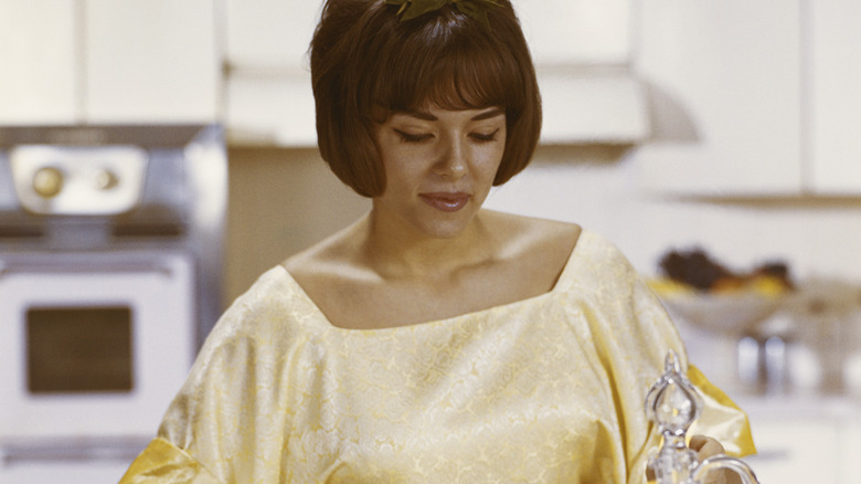 1960s era woman cooking