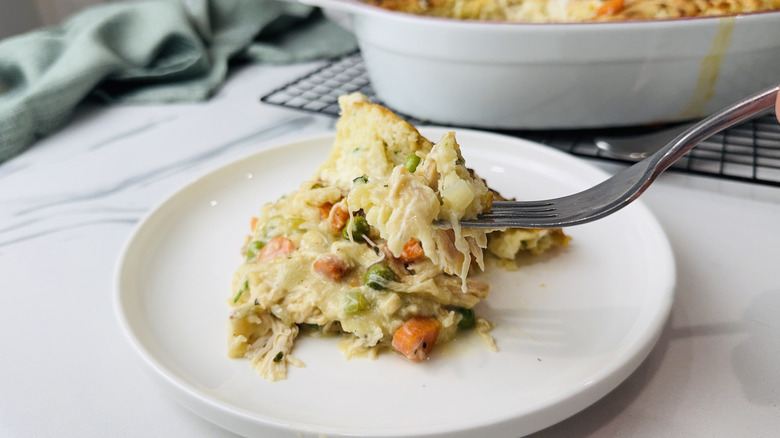Forkful of cheesy chicken cobbler