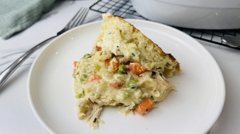 Cheesy chicken cobbler serving on plate