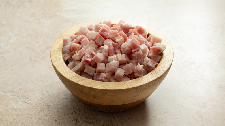 A bowl of diced pancetta.