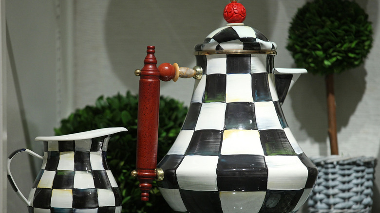 Two pieces of MacKenzie-Childs pottery.