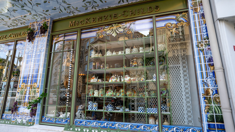 The front window of a MacKenzie-Childs retail store.