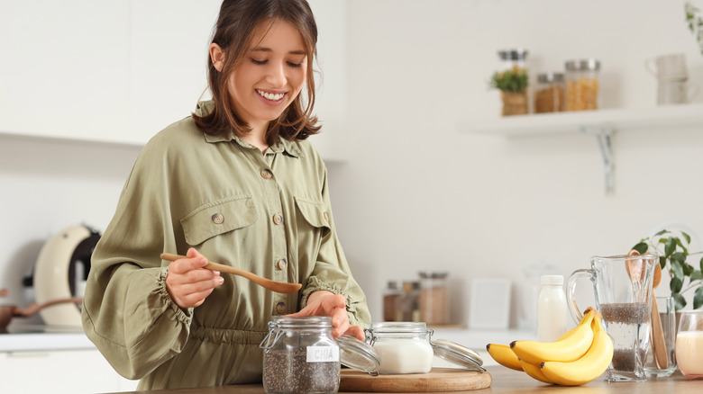 Woman making chia seed pudding