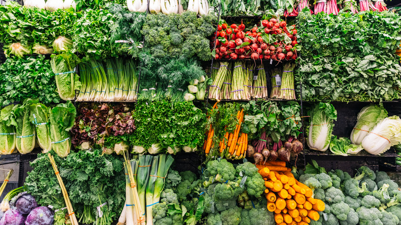 assorted vegetables in the produce section of a grocery store