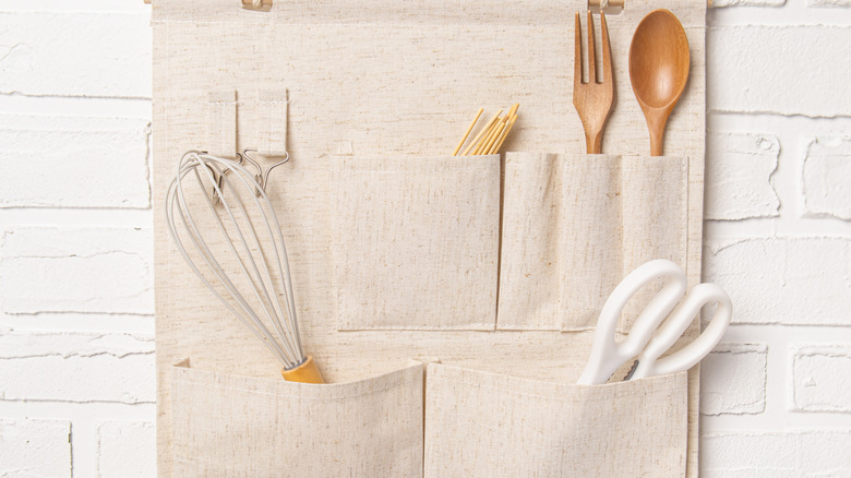Hanging organizer with kitchen utensils