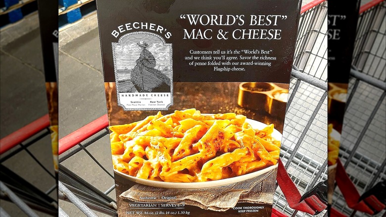 Container of Beecher's "World's Best" Mac & Cheese propped up in a Costco grocery cart