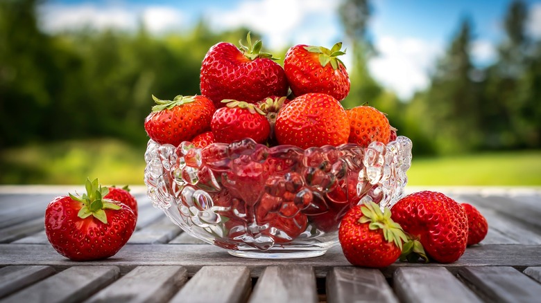 strawberries in glass bowl