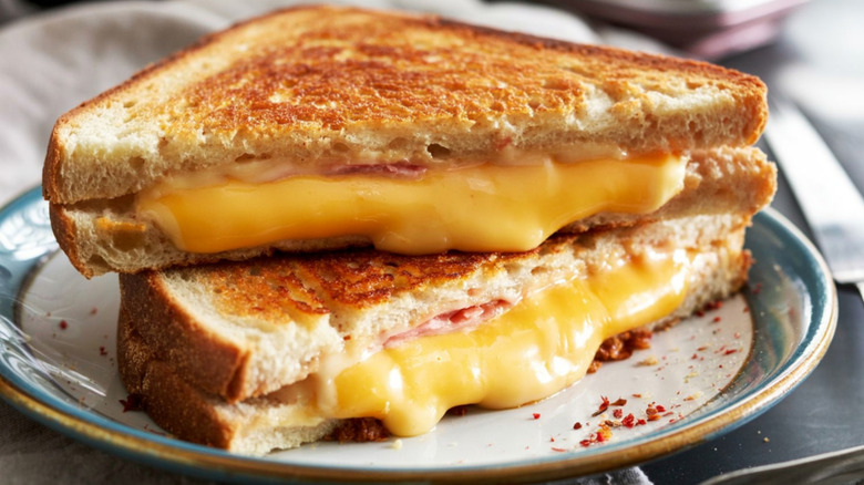 Buttery pan-toasted grilled cheese bread oozing with cheddar.