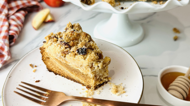 Slice of honey apple cake on a plate