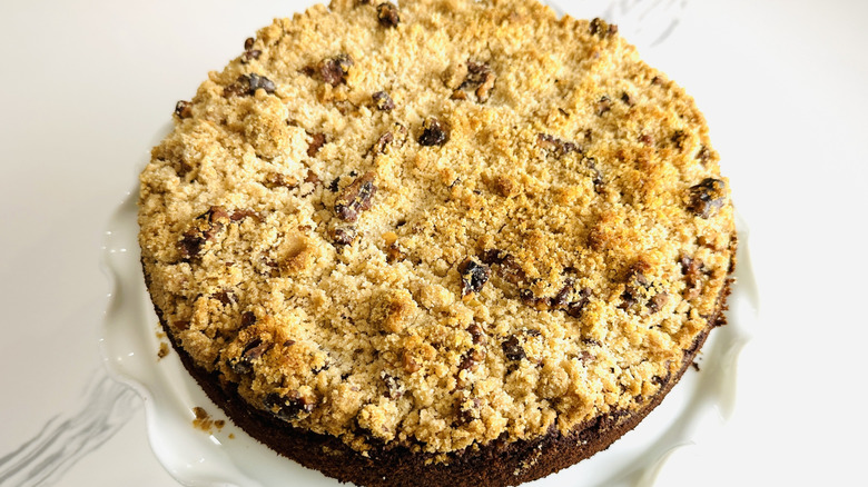 Baked honey apple cake on cake stand