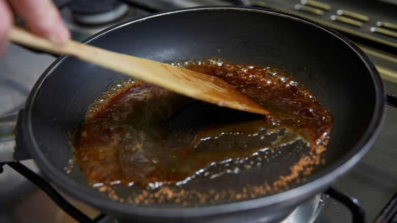 making sugar syrup in a pan